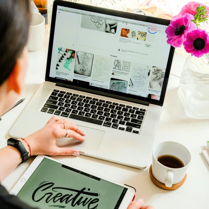 desk with diy tutorials and computer